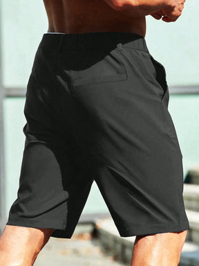 Bermuda masculina de cor sólida com bolsos