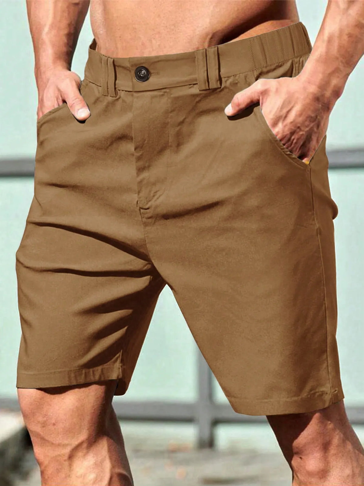 Bermuda masculina de cor sólida com bolsos